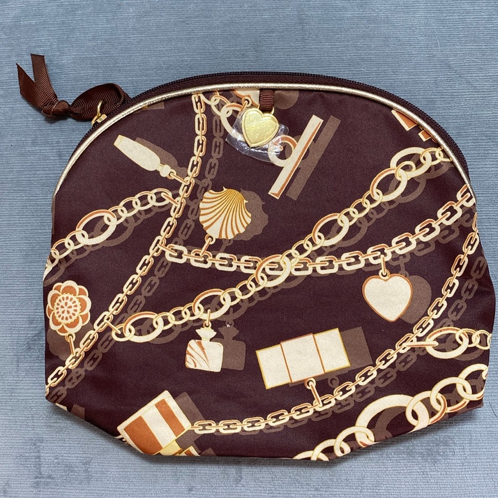 Estée Lauder and WT cosmetic bag chain and charm design. Brown and cream.9”x7.5”